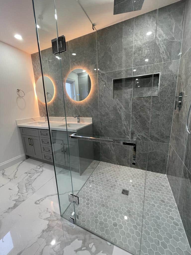 Transform Your Home with a Professional Bathroom Renovation Contractor in GTA and Niagara 2 Stylish bathroom renovation with freestanding tub and rainfall shower in GTA and Niagara Region.